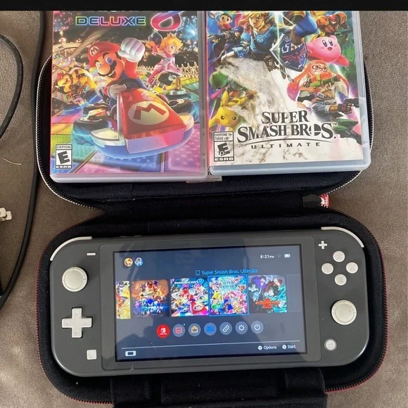 Nintendo Switch Lite plus 2 games